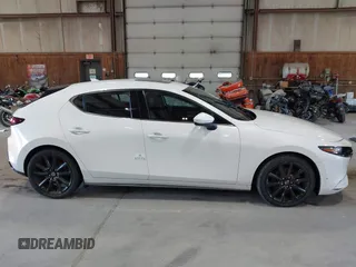 2021 Mazda 3 Premium with VIN JM1BPBML6M1348258, listed as a IAAI auction lot 42752477 with 35,285 mi miles and . Bid and sale history available at DreamBid. Image 13.