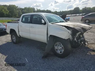 2016 Toyota Tacoma SR with VIN 5TFCZ5AN7GX031404, listed as a Copart auction lot 57049644 with Not Provided miles and Salvage Title. Bid and sale history available at DreamBid. Image 4.