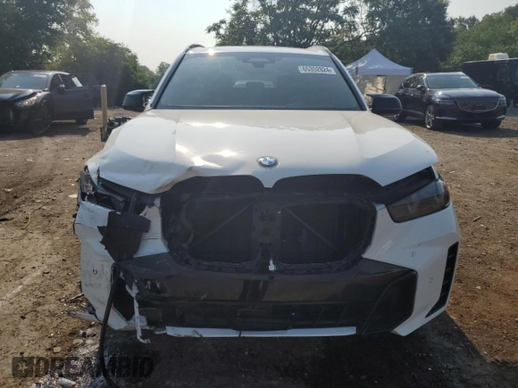 2024 BMW X5 M60i with VIN 5UX33EU04R9U00310, listed as a Copart auction lot 65352824 with 16,088 mi miles and Salvage Title. Bid and sale history available at carsss.com. Image 5.