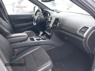 2020 Jeep Grand Cherokee Laredo E with VIN 1C4RJFAG9LC291300, listed as a IAAI auction lot 41315443 with 29,979 mi miles and . Bid and sale history available at DreamBid. Image 5.