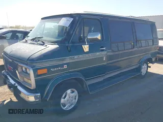 1994 GMC Vandura z VIN 1GDEG25K4RF523356, wystawiony jako IAAI lot #41854612 z przebiegiem 187 013 mil mil oraz . Historia ofert i sprzedaży dostępna na DreamBid. Obrazek 2.