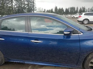 2019 Nissan Sentra S z VIN 3N1AB7AP3KY358451, wystawiony jako IAAI lot #41960388 z przebiegiem 129 478 mil mil oraz . Historia ofert i sprzedaży dostępna na DreamBid. Obrazek 13.