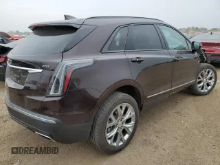 2021 Cadillac XT5 AWD Sport with VIN 1GYKNGRS2MZ142286, listed as a Copart auction lot 60699515 with 17,406 mi miles and Salvage title. Bid and sale history available at DreamBid. Image 3.