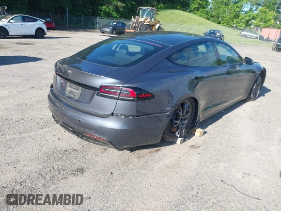 2022 Tesla Model S with VIN 5YJSA1E57NF479056, listed as a IAAI auction lot 42091009 with 78,272 mi miles and . Bid and sale history available at DreamBid. Image 4.