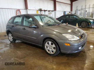 2002 Ford Focus ZX5 z VIN 3FAFP37352R180981, wystawiony jako Copart lot #55856125 z przebiegiem 59 785 mil mil oraz Szkoda całkowita • Salvage title. Historia ofert i sprzedaży dostępna na DreamBid. Obrazek 4.