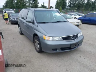 2001 Honda Odyssey EX z VIN 2HKRL18601H510284, wystawiony jako IAAI lot #42467617 z przebiegiem 160 052 mil mil oraz . Historia ofert i sprzedaży dostępna na DreamBid. Obrazek 1.