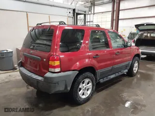 2006 Ford Escape XLT with VIN 1FMYU03106KC15575, listed as a IAAI auction lot 42017906 with 187,733 mi miles. Bid and sale history available at carsss.com. Image 4.