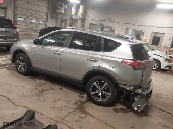 2017 Toyota RAV4 XLE with VIN 2T3RFREV3HW555319, listed as a IAAI auction lot 41946308 with 134,073 mi miles. Bid and sale history available at carsss.com. Image 3.