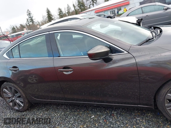 2018 Mazda 6 Grand Touring with VIN JM1GL1TYXJ1301545, listed as a IAAI auction lot 41131114 with 34,089 mi miles and . Bid and sale history available at DreamBid. Image 13.