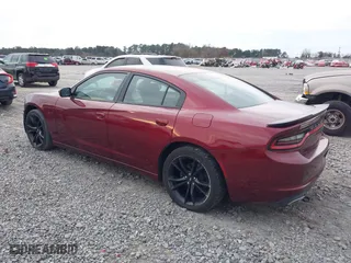 2017 Dodge Charger SE with VIN 2C3CDXBGXHH612156, listed as a IAAI auction lot 41028308 with 123,438 mi miles. Bid and sale history available at carsss.com. Image 3.