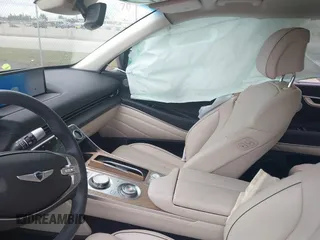 2024 Genesis GV80 with VIN KMUHCESC7RU155291, listed as a IAAI auction lot 41544670 with 10,899 mi miles and . Bid and sale history available at DreamBid. Image 5.