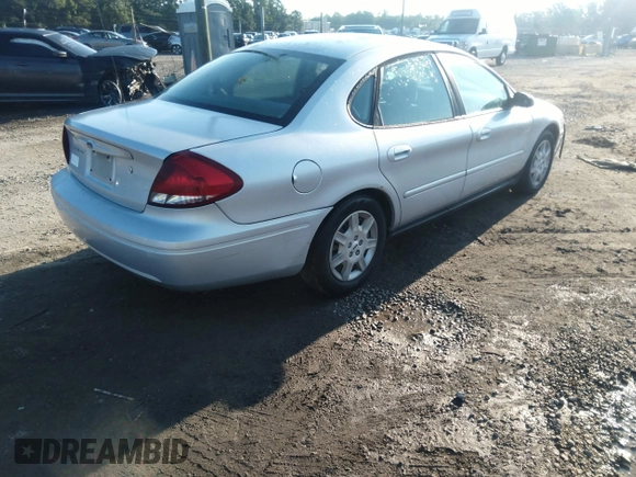 2005 Ford Taurus SE z VIN 1FAFP53U25A216523, wystawiony jako IAAI lot #42648554 z przebiegiem 175 042 mil mil oraz . Historia ofert i sprzedaży dostępna na DreamBid. Obrazek 4.