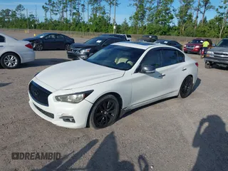 2014 Infiniti Q50 Hybrid Premium with VIN JN1AV7AP2EM690136, listed as a IAAI auction lot 42481510 with 203,832 mi miles and . Bid and sale history available at DreamBid. Image 17.
