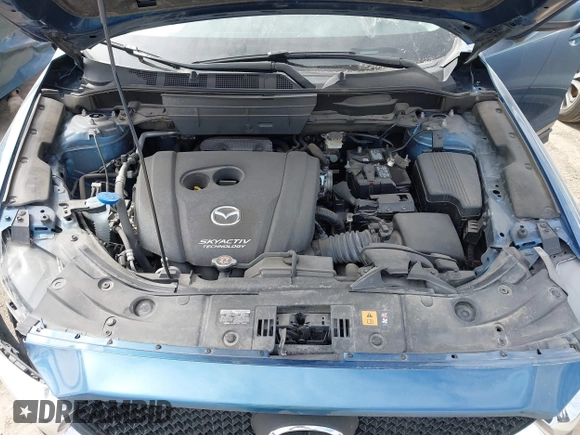 2018 Mazda CX-5 Sport with VIN JM3KFBBM8J0400741, listed as a IAAI auction lot 41860323 with 54,911 mi miles. Bid and sale history available at carsss.com. Image 10.