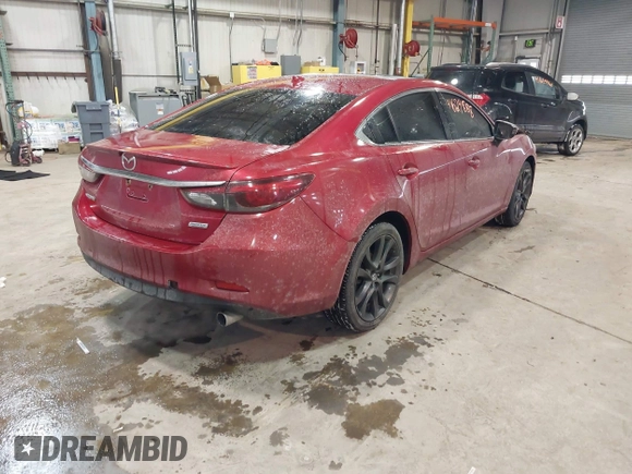 2016 Mazda Mazda6 i Grand Touring with VIN JM1GJ1W54G1432681, listed as a IAAI auction lot 41624888 with 100,410 mi miles. Bid and sale history available at carsss.com. Image 4.