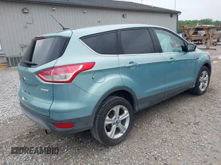 2013 Ford Escape SE with VIN 1FMCU0GX0DUC30622, listed as a IAAI auction lot 42281904 with 74,165 mi miles and . Bid and sale history available at DreamBid. Image 4.
