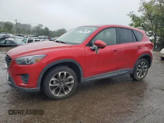 2016 Mazda CX-5 Grand Touring with VIN JM3KE4DY3G0713283, listed as a Copart auction lot 73346194 with 135,382 mi miles and Salvage Title. Bid and sale history available at carsss.com. Image 1.