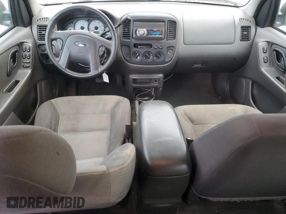 2004 Ford Escape with VIN 1FMCU02144KB63439, listed as a Copart auction lot 85310514 with 275,625 mi miles and Salvage title. Bid and sale history available at DreamBid. Image 8.