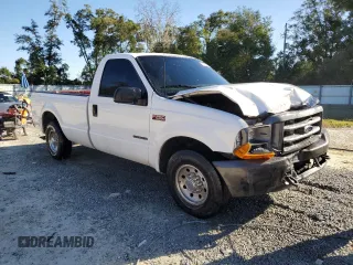 2000 Ford Super Duty F-250 XL with VIN 1FTNF20F9YEC91357, listed as a Copart auction lot 76673234 with 318,306 mi miles and Salvage Title. Bid and sale history available at carsss.com. Image 4.