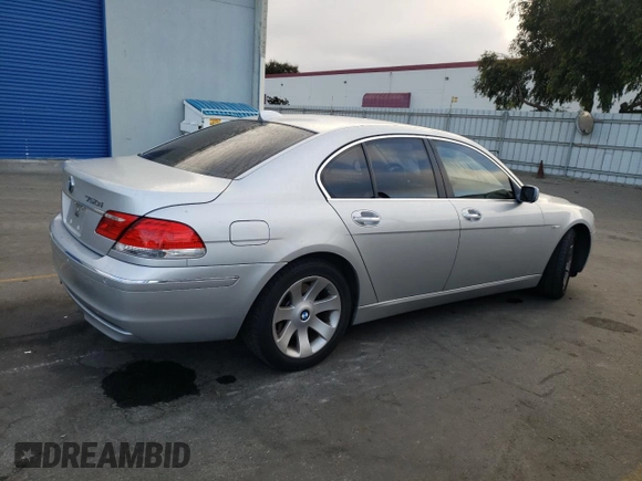 2006 BMW 7 Series 750i with VIN WBAHL83586DT05258, listed as a Copart auction lot 77033744 with 129,376 mi miles and Salvage Title. Bid and sale history available at DreamBid. Image 3.