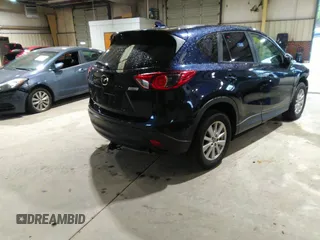 2016 Mazda CX-5 Sport with VIN JM3KE2BY5G0782385, listed as a IAAI auction lot 41971163 with 87,251 mi miles. Bid and sale history available at carsss.com. Image 4.