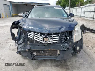 2014 Cadillac SRX Performance Collection с VIN 3GYFNCE34ES580069, выставлен на аукционе Copart как лот 60662415 с пробегом 141 107 миль миль и Списание • Salvage title. История ставок и продаж доступна на DreamBid. Изображение 5.