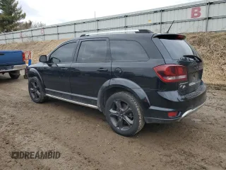 2018 Dodge Journey Crossroad with VIN 3C4PDDGGXJT387514, listed as a Copart auction lot 50145295 with 128,625 mi miles and Clean Title. Bid and sale history available at DreamBid. Image 2.