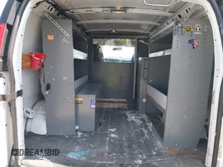 2013 Chevrolet Express Cargo with VIN 1GCWGFCB8D1902532, listed as a IAAI auction lot 42452764 with 95,113 mi miles and . Bid and sale history available at DreamBid. Image 8.