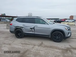 2024 Volkswagen Atlas SE z VIN 1V2JR2CA1RC537982, wystawiony jako IAAI lot #41429786 z przebiegiem 33 846 mil mil oraz . Historia ofert i sprzedaży dostępna na DreamBid. Obrazek 13.