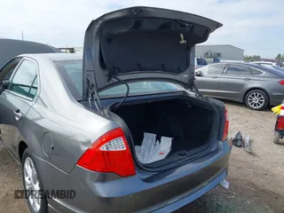2012 Ford Fusion SE z VIN 3FAHP0HG0CR436745, wystawiony jako IAAI lot #41598812 z przebiegiem 116 305 mil mil oraz . Historia ofert i sprzedaży dostępna na DreamBid. Obrazek 18.