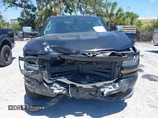 2017 Chevrolet Silverado 1500 LS with VIN 1GCRCNEC1HZ337363, listed as a IAAI auction lot 42059934 with 81,773 mi miles and . Bid and sale history available at DreamBid. Image 12.