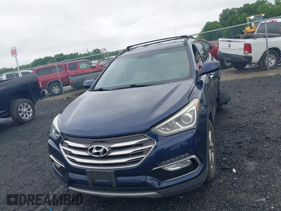 2017 Hyundai Santa Fe 2.4L z VIN 5XYZU3LB7HG418300, wystawiony jako IAAI lot #42369329 z przebiegiem 126 326 mil mil oraz . Historia ofert i sprzedaży dostępna na DreamBid. Obrazek 12.