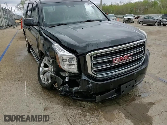 2015 GMC Yukon SLT z VIN 1GKS2BKC1FR112708, wystawiony jako Copart lot #53963165 z przebiegiem 123 331 mil mil oraz Szkoda całkowita • Salvage title. Historia ofert i sprzedaży dostępna na DreamBid. Obrazek 14.
