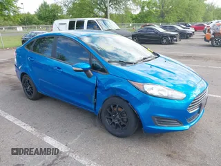 2015 Ford Fiesta SE z VIN 3FADP4BJ6FM125929, wystawiony jako IAAI lot #42181609 z przebiegiem 136 388 mil mil oraz . Historia ofert i sprzedaży dostępna na DreamBid. Obrazek 6.