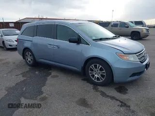 2012 Honda Odyssey EX-L with VIN 5FNRL5H68CB090010, listed as a IAAI auction lot 41940187 with 173,597 mi miles and . Bid and sale history available at carsss.com. Image 1.