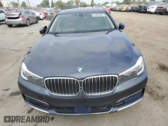2016 BMW 7 Series 740i with VIN WBA7E2C51GG546677, listed as a Copart auction lot 63455445 with 106,553 mi miles and Salvage title. Bid and sale history available at DreamBid. Image 5.