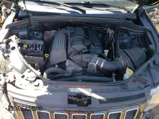 2012 Jeep Grand Cherokee SRT8 with VIN 1C4RJFDJ2CC352056, listed as a Copart auction lot 48810994 with 114,807 mi miles and Salvage Title. Bid and sale history available at carsss.com. Image 11.