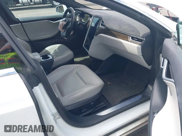 2016 Tesla Model S 90D with VIN 5YJSA1E21GF121962, listed as a IAAI auction lot 42130291 with 114,670 mi miles and . Bid and sale history available at DreamBid. Image 5.