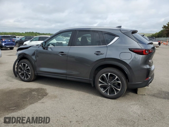 2023 Mazda CX-5 2.5 S Premium Package with VIN JM3KFBDM5P0229694, listed as a Copart auction lot 64811974 with 9,901 mi miles and Non Repairable. Bid and sale history available at carsss.com. Image 2.