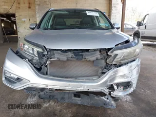 2015 Honda CR-V EX-L with VIN 2HKRM4H72FH616198, listed as a IAAI auction lot 42038752 with 82,826 mi miles and . Bid and sale history available at carsss.com. Image 6.