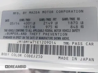 2014 Mazda 3 i Grand Touring with VIN JM1BM1W71E1209014, listed as a IAAI auction lot 41636308 with 218,277 mi miles and . Bid and sale history available at carsss.com. Image 9.