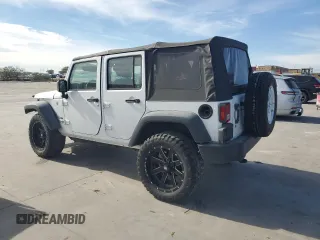 2018 Jeep Wrangler JK Unlimited Sport S with VIN 1C4BJWDG7JL865323, listed as a Copart auction lot 82657514 with 15,408 mi miles and Salvage Title. Bid and sale history available at carsss.com. Image 2.