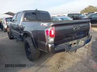 2021 Toyota Tacoma 4WD SR5 with VIN 3TMDZ5BN2MM108586, listed as a IAAI auction lot 41604953 with 65,422 mi miles. Bid and sale history available at carsss.com. Image 3.