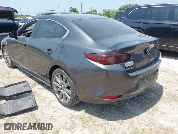 2021 Mazda 3 Preferred with VIN JM1BPACL1M1317639, listed as a IAAI auction lot 41939340 with 51,195 mi miles and . Bid and sale history available at DreamBid. Image 3.