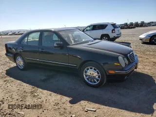 2001 Mercedes-Benz E-Class with VIN WDBJF65J51B386619, listed as a Copart auction lot 46623515 with 108,209 mi miles and Salvage Title. Bid and sale history available at carsss.com. Image 4.