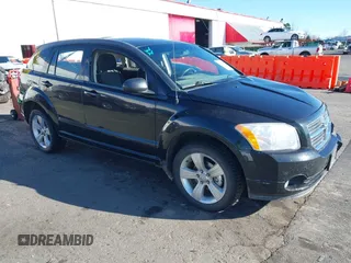 2010 Dodge Caliber Mainstreet z VIN 1B3CB3HA0AD546458, wystawiony jako IAAI lot #41558583 z przebiegiem 84 603 mil mil oraz . Historia ofert i sprzedaży dostępna na DreamBid. Obrazek 1.