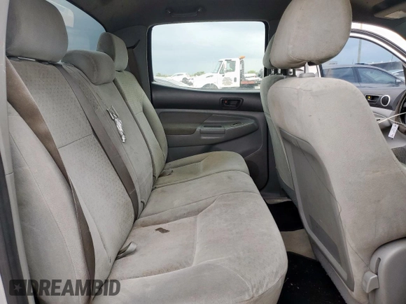 2007 Toyota Tacoma PreRunner z VIN 3TMJU62N27M036493, wystawiony jako Copart lot #59176245 z przebiegiem 268 588 mil mil oraz Szkoda całkowita • Salvage title. Historia ofert i sprzedaży dostępna na DreamBid. Obrazek 10.