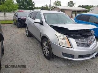 2014 Cadillac SRX Luxury Collection z VIN 3GYFNBE30ES613935, wystawiony jako IAAI lot #42198272 z przebiegiem Nie podano mil oraz . Historia ofert i sprzedaży dostępna na DreamBid. Obrazek 1.