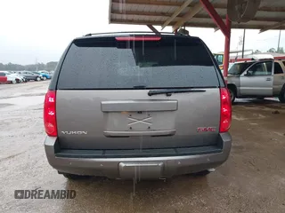 2014 GMC Yukon SLT with VIN 1GKS1CE00ER164663, listed as a IAAI auction lot 41547771 with 178,998 mi miles. Bid and sale history available at carsss.com. Image 16.