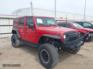 2010 Jeep Wrangler Unlimited Rubicon with VIN 1J4BA6H11AL128604, listed as a IAAI auction lot 41689751 with 79,807 mi miles. Bid and sale history available at carsss.com. Image 1.